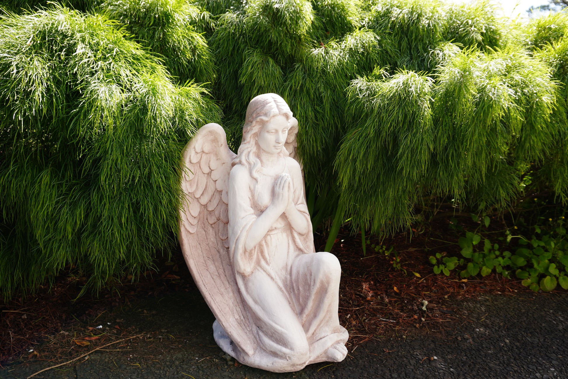 Side view of Praying Angel Statue